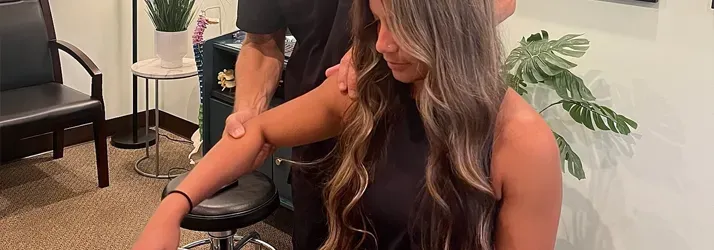 Woman in a arms adjustmnent session.