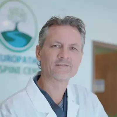 A headshot of Dr. Greg Grochowski, a chiropractor at Neuropathy and Spine Center of South Carolina