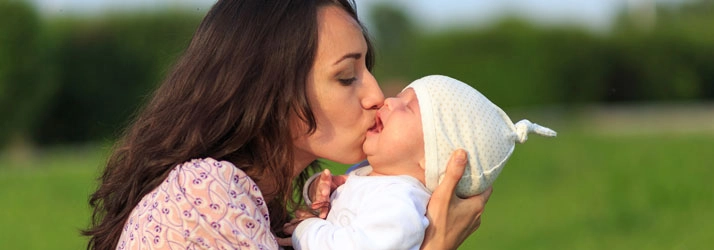 Chiropractic Charleston SC Mother Holding Colic Baby Crying